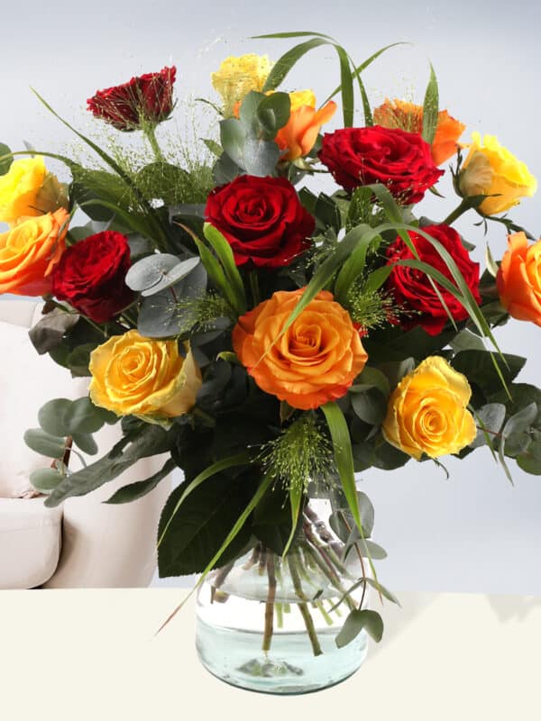 Gemengd boeket geel-oranje-rood met panicum en eucalyptus bezorgen